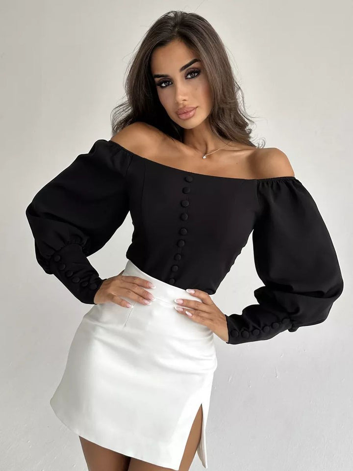 Dame Off-Shoulder Bluse med elegante puffærmer og knapdetaljer Stilla