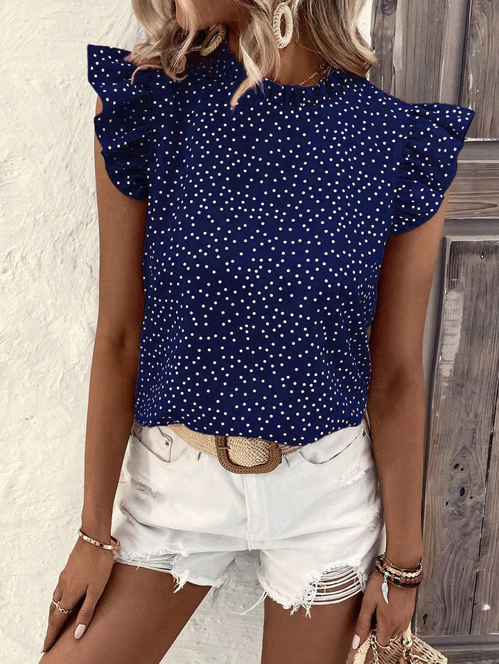 Dame Leges bluse med ruffles detaljer og polka prikker Stilla