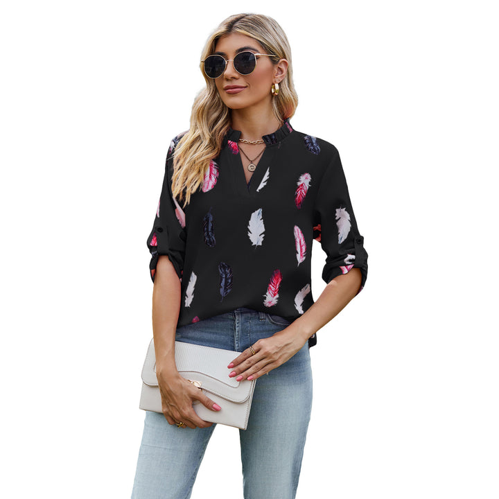Damebluse med elegant fjerdesign og halvlange ærmer Stilla