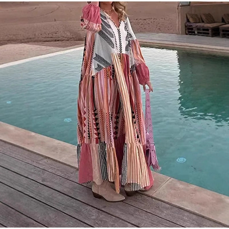 Dame Boho-inspireret maxikjole med voluminøse ærmer og farverigt patchworkdesign Stilla