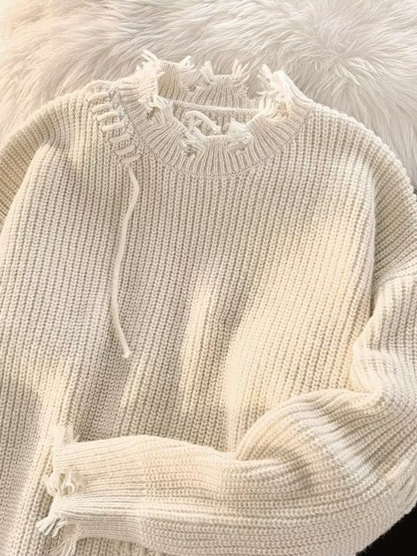 Dame Oversized Pullover med moderne frynser og unikke kontrastsyninger Stilla
