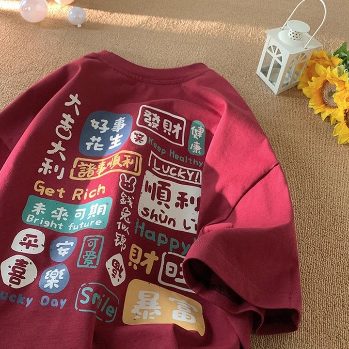 Dame T-Shirt med kreativ tekst og afslappet snit Stilla