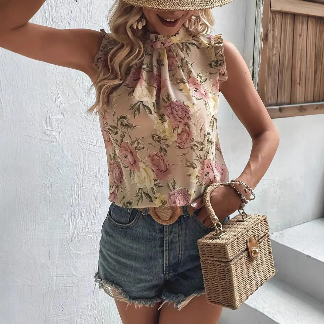 Dame rynket bluse med højhalsede krave og blomsterdesign Stilla