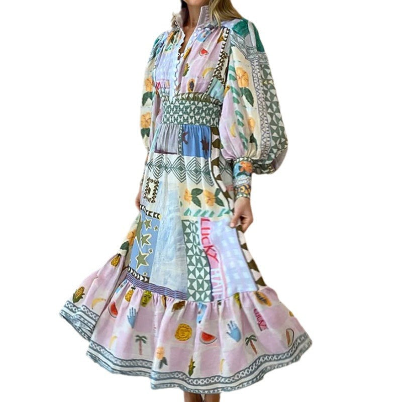 Kvindernes lange maxi kjole med farverigt patchwork mønster og voluminøse ærmer Stilla
