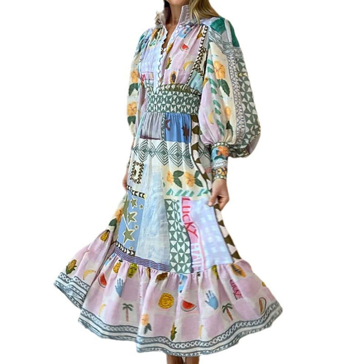 Kvindernes lange maxi kjole med farverigt patchwork mønster og voluminøse ærmer Stilla