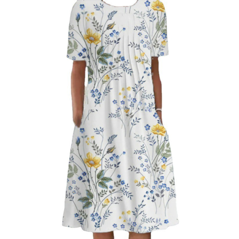 Dame fritidskjole med blomstret design og praktiske lommer Stiila