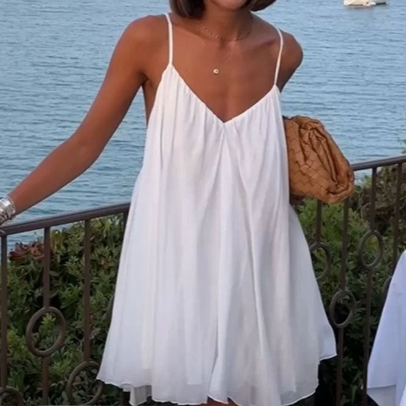 Dame sommerligt flagrende kjole med dyb V-udskæring og fine spaghetti-stropper Stilla