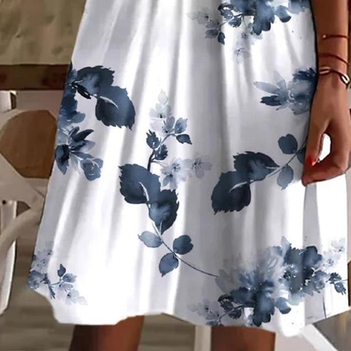 Dame Flydende Sommerkjole med V-udskæring og floralt design Stilla