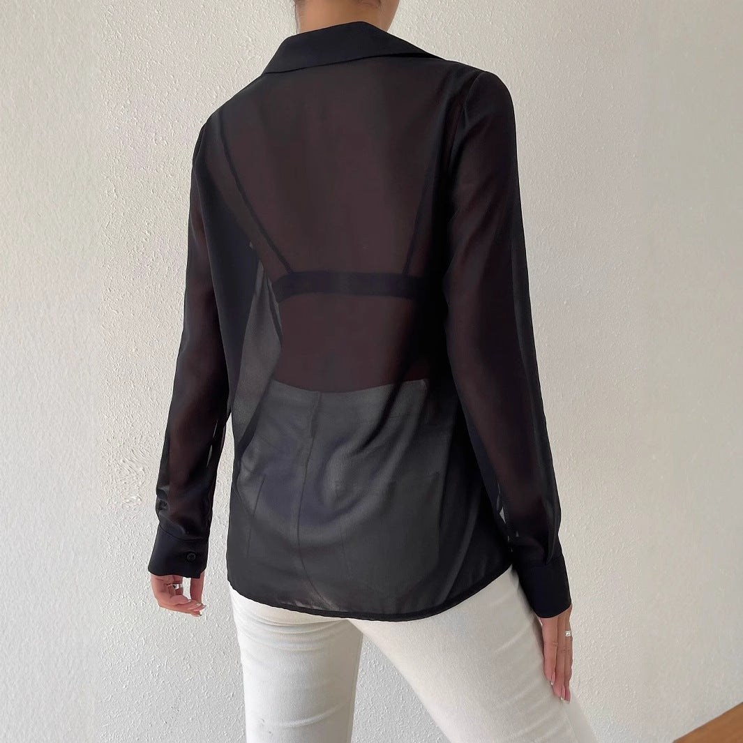 Dame afslappet transparent bluse med knaplukning og manchetter Stilla