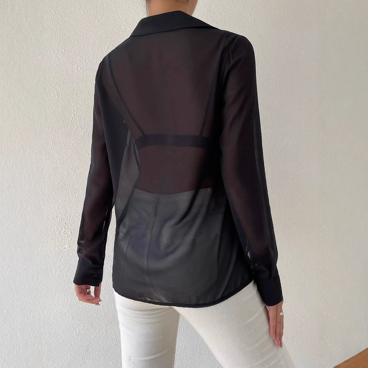 Dame afslappet transparent bluse med knaplukning og manchetter Stilla