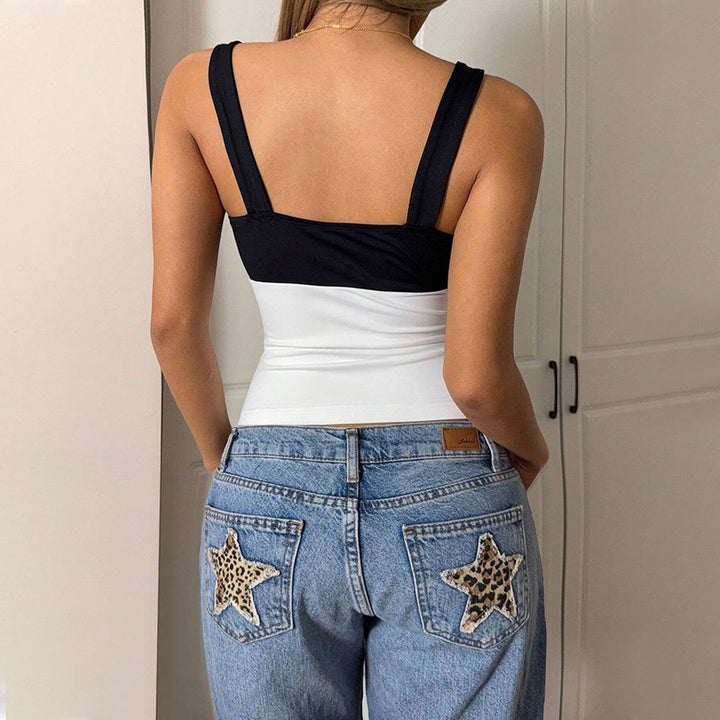 Kvinders elegante crop top med asymmetrisk design og kontrasterende farver Stilla