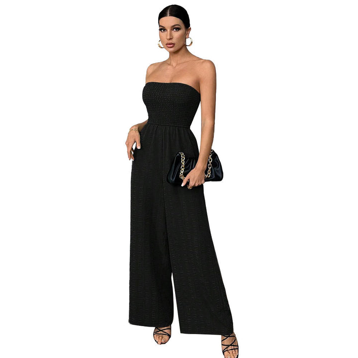 Kvinders afslappede jumpsuit med off-shoulder design og elastisk top Stilla