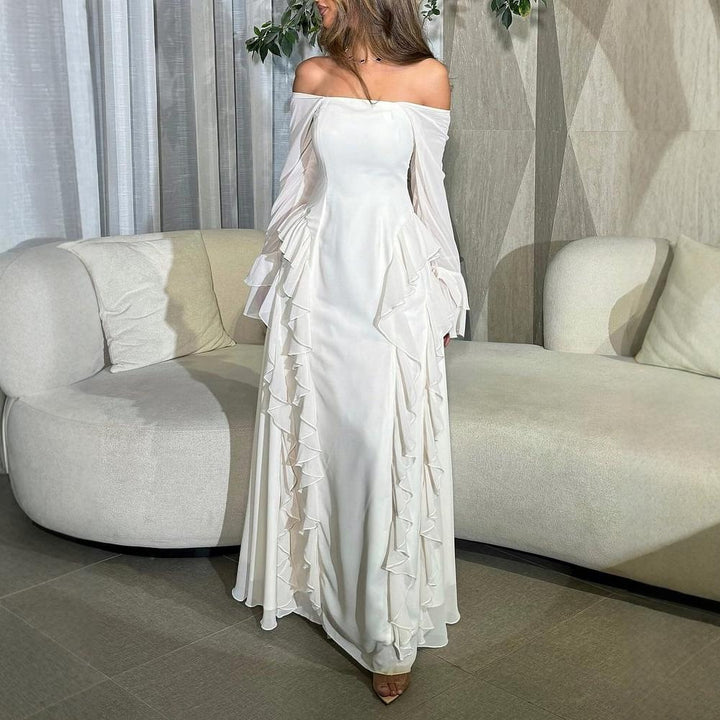 Kvinders elegante maxikjole med off-shoulder ærmer og flæse detaljer Skovae
