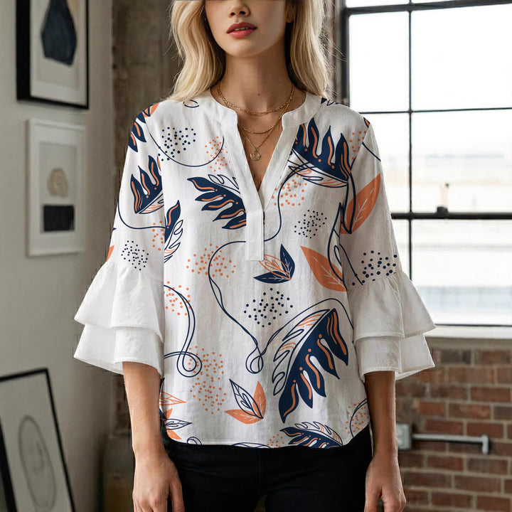 Dame Elegant top med volumiøse puffærmer og floraltryk Skovae