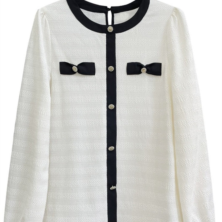 Dame elegant bluse med dekorative sløjfer og knapdetaljer Stilla