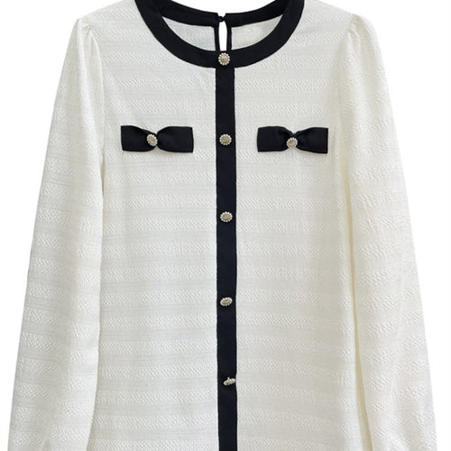 Dame elegant bluse med dekorative sløjfer og knapdetaljer Stilla