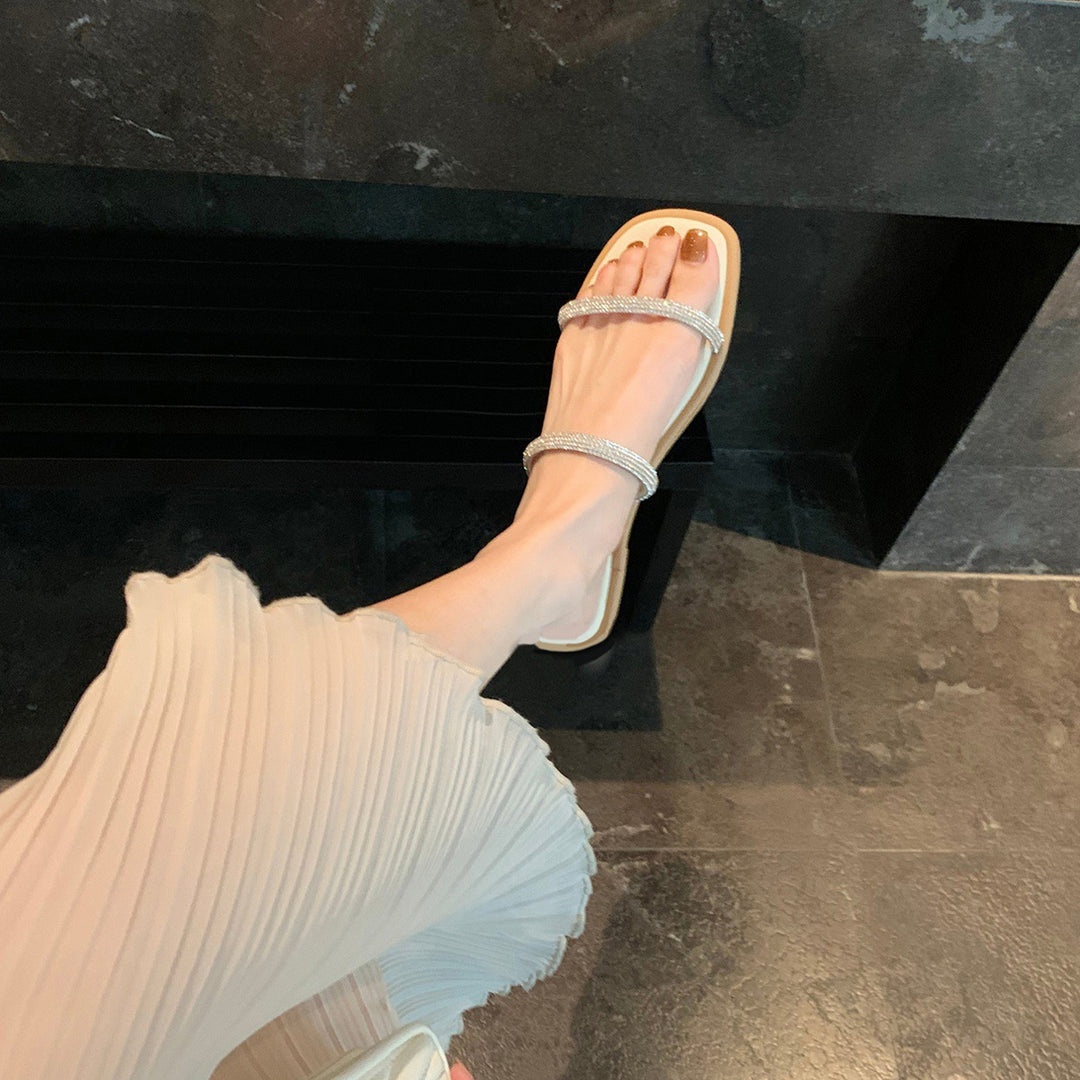 Dame flade slidesandaler med glimmersten Stilla