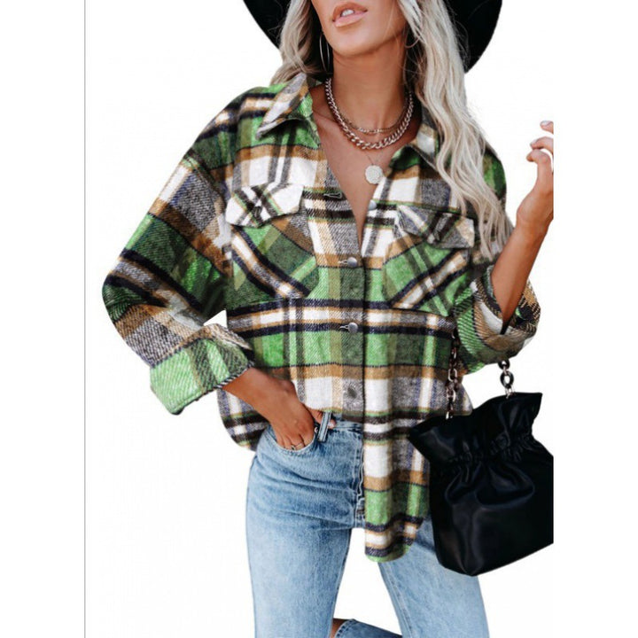 Dame ternet bluse i afslappet oversized stil med lommer Stilla