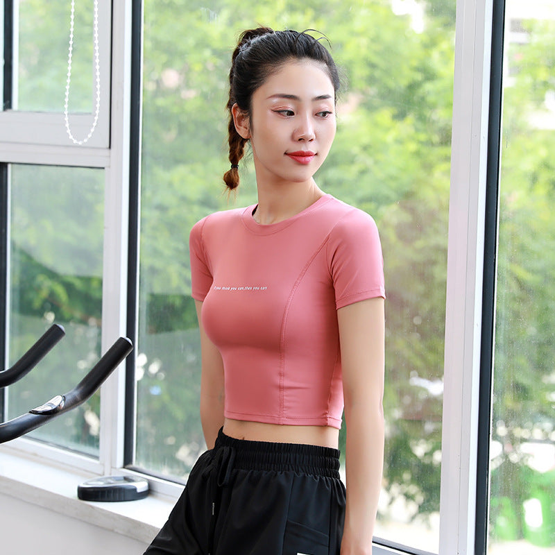 Dame Sports kortærmet crop-top med åndbart funktionsmateriale og figurformende snit Stilla