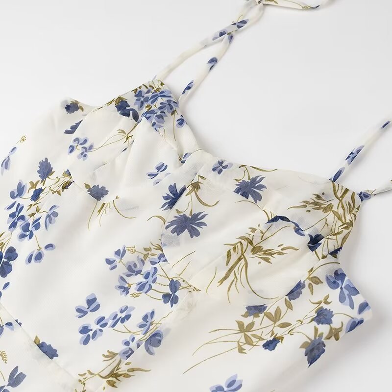 Dame maxikjole med delikate spaghetti-stropper og blomstret design Stilla