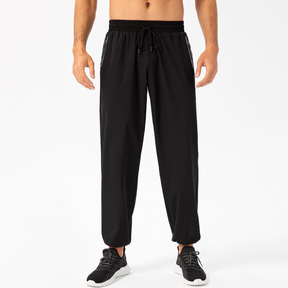 Herrer Sporty Joggingbukser med elastisk taljebånd og praktiske lynlåslommer Stilla