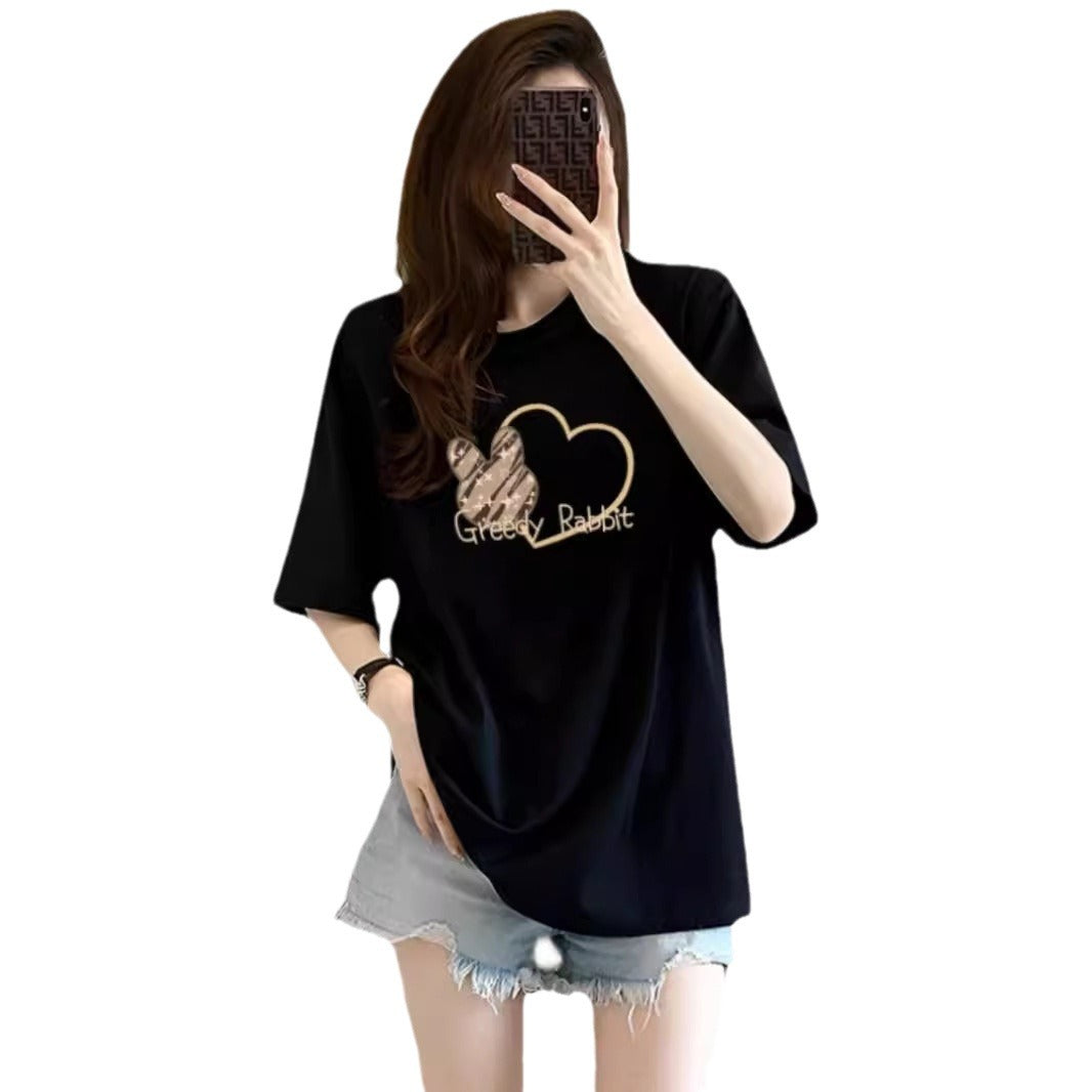 Dame T-shirt med afslappet grafiktryk og stort hjertemotiv Stilla
