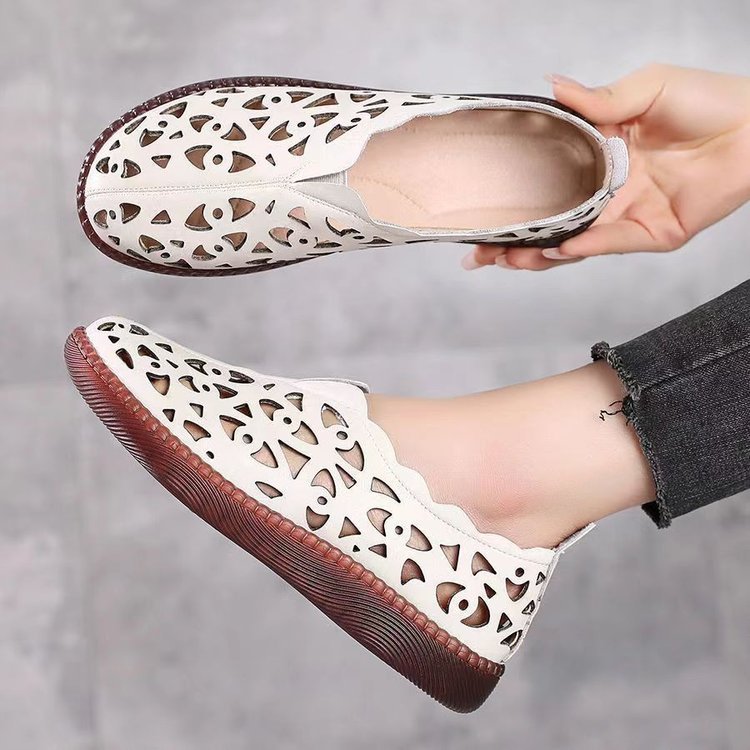 Dame åndbar og moderigtige slippers med elegant snit og gennembrudt design Stilla