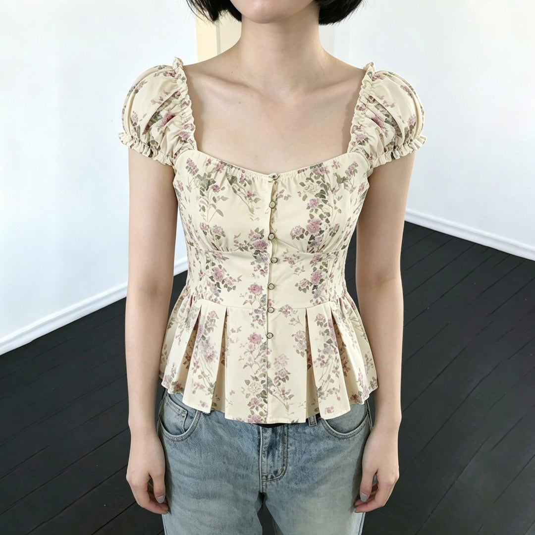 Damebluse med blomsterdesign og flæseærmer Skovae