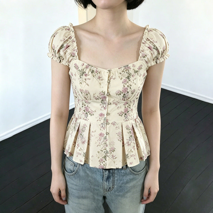 Damebluse med blomsterdesign og flæseærmer Skovae