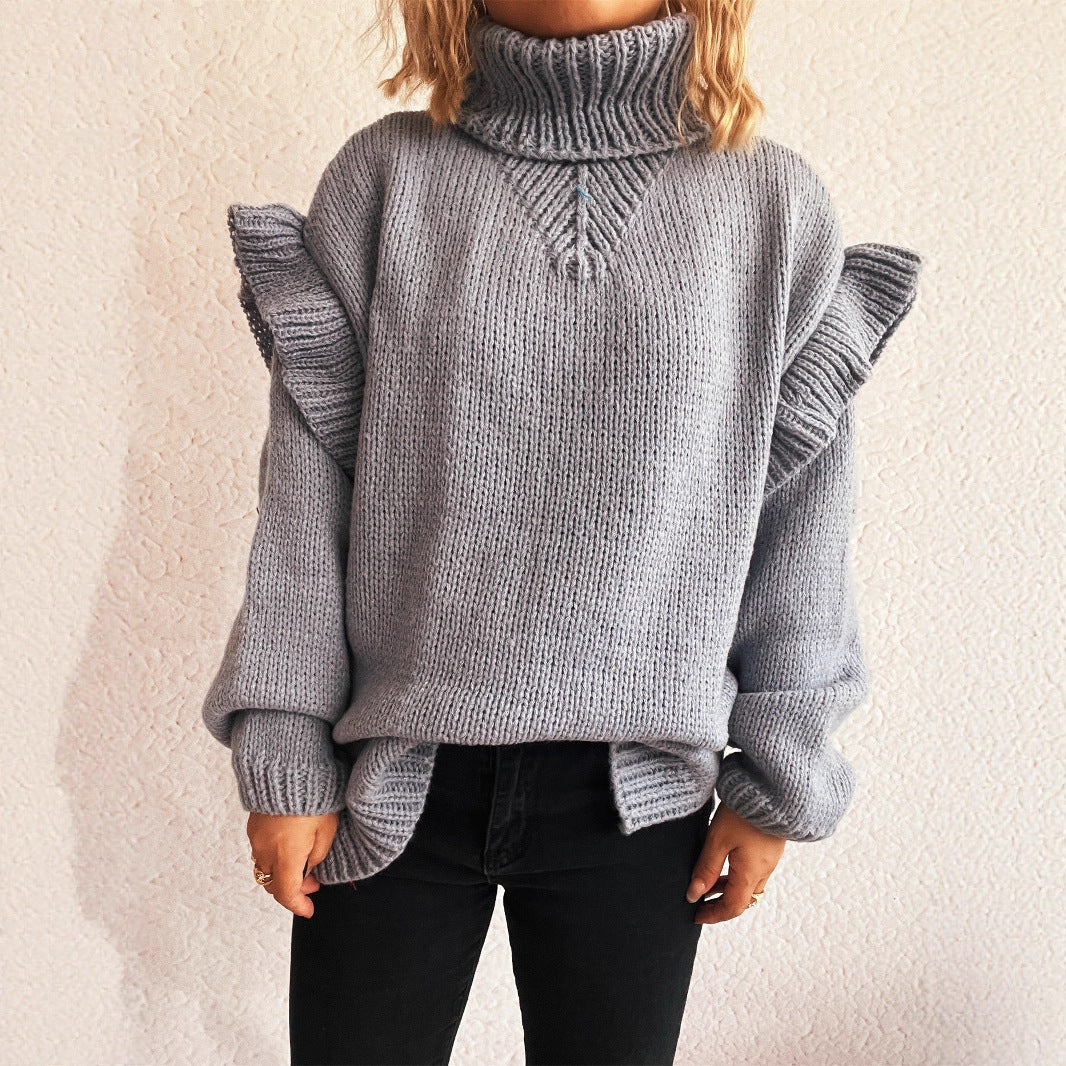 Kvinders strikket sweater med volangdetaljer og høj krave Stilla