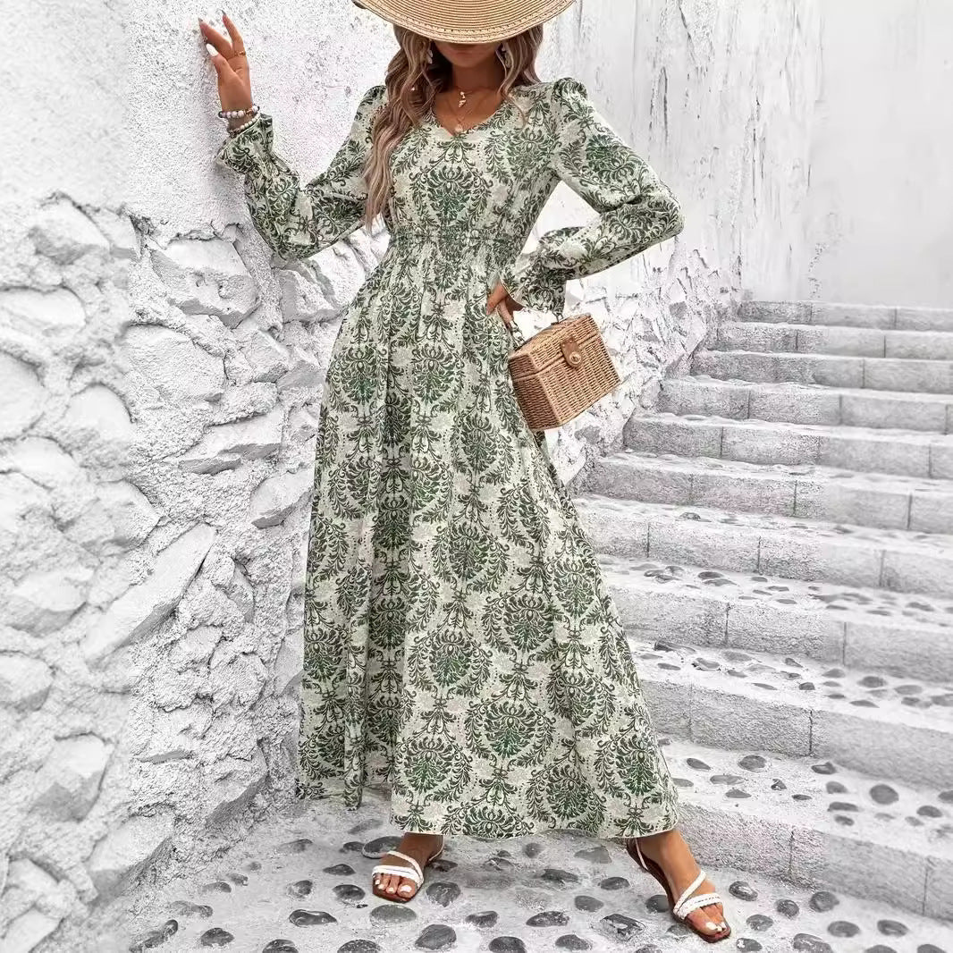 Dame Maxikjole med floralt design og vidde skørt Stilla