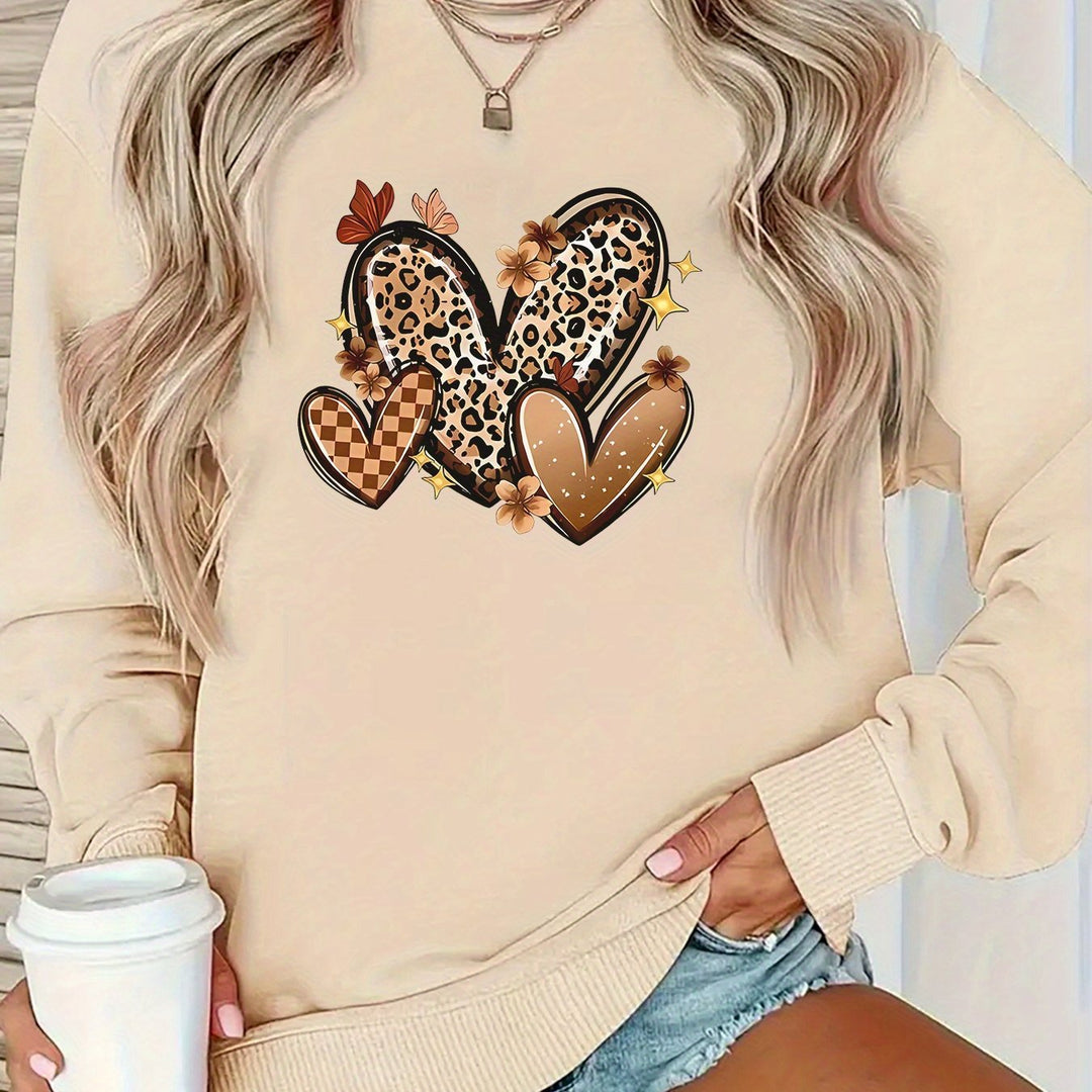 Kvinders sweatshirt med attraktive hjerte motiv.