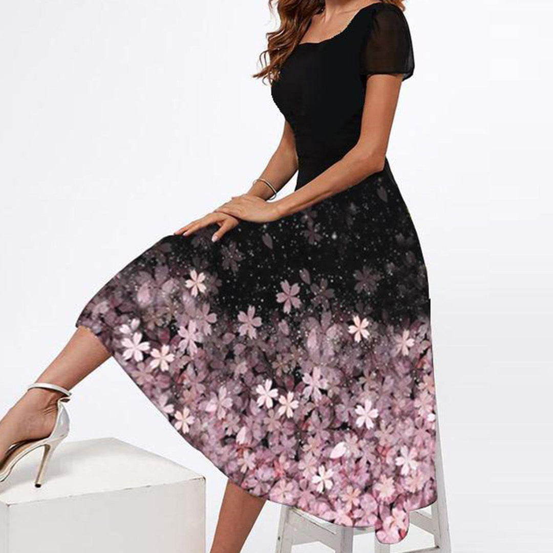 Dame Elegant Maxikjole med blomsterdesign og transparente ærmer Stilla