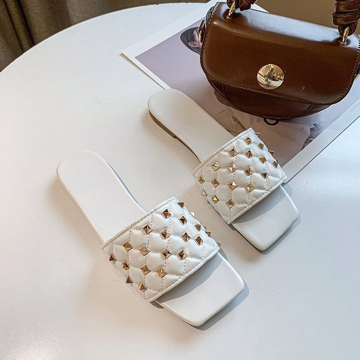 Damer Glamourøse Slide-sandaler med dekorativt nitte-design og komfortabel fodseng Stilla