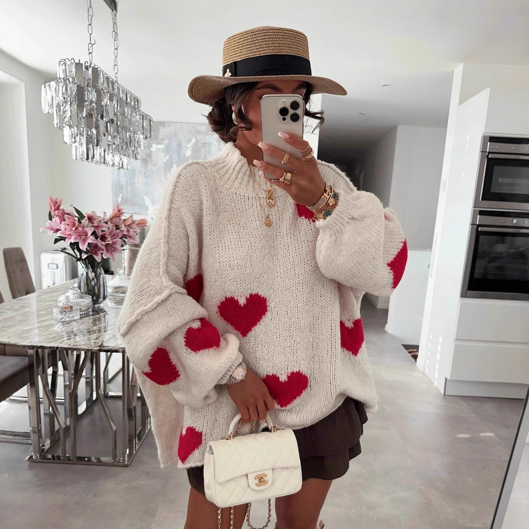 Kvindes moderigtige oversized sweater med hjerteformet mønster og voluminøse ærmer Stilla
