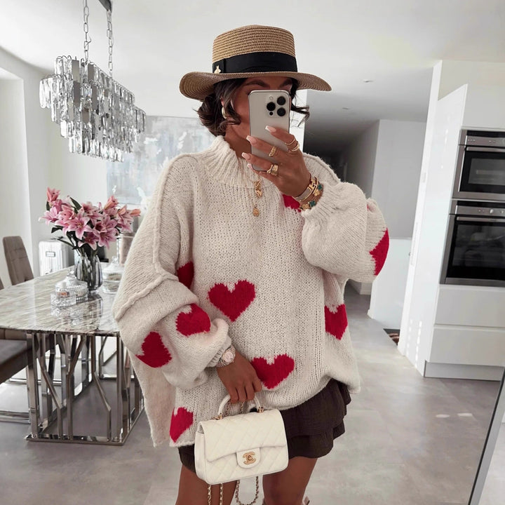 Kvindes moderigtige oversized sweater med hjerteformet mønster og voluminøse ærmer Stilla