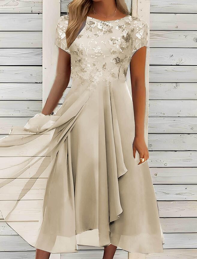 Dame med elegant chiffon midikjole med floral spidsapplikation og flydende klokkeslæt skørt Skovae