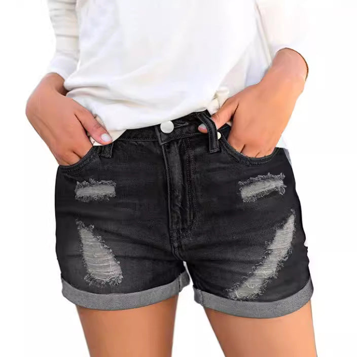 Dame jeansshorts med moderne rivdetaljer og afslappet snit Skovae