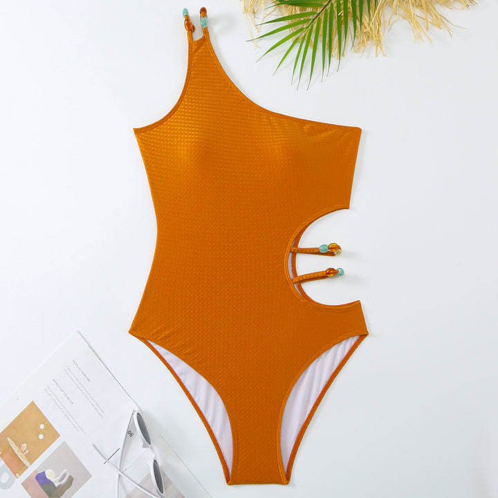 Dame Énteiler Badedragt med trendy Cut-Outs og matchende Indpakningsnederdel Stilla