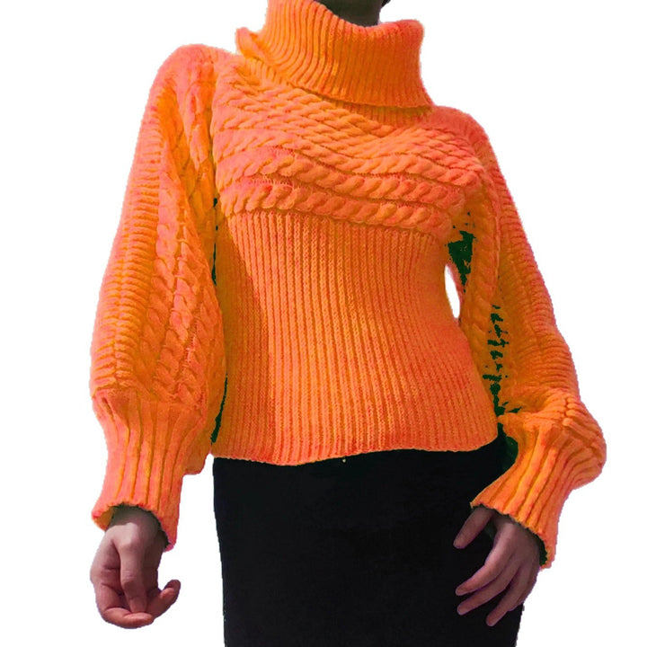 Kvinders strikkede pullover med rullekrave og struktureret design Stilla