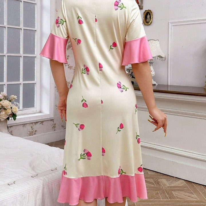Dame Midikjole med blomsterprint og elegant flæsekant Stilla