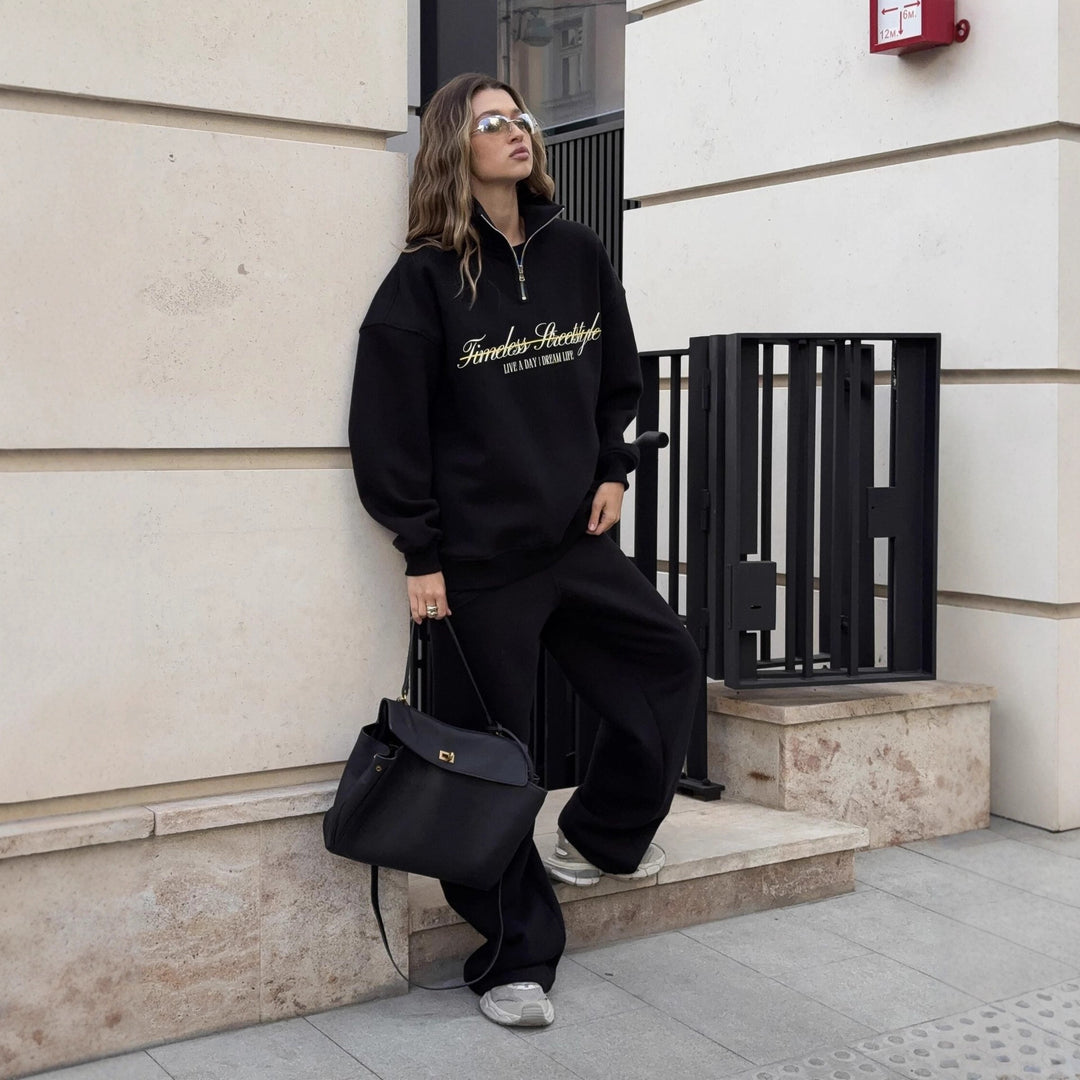 Kvindernes sporty halvlange pullover med fuldlængde lynlås og oversized pasform