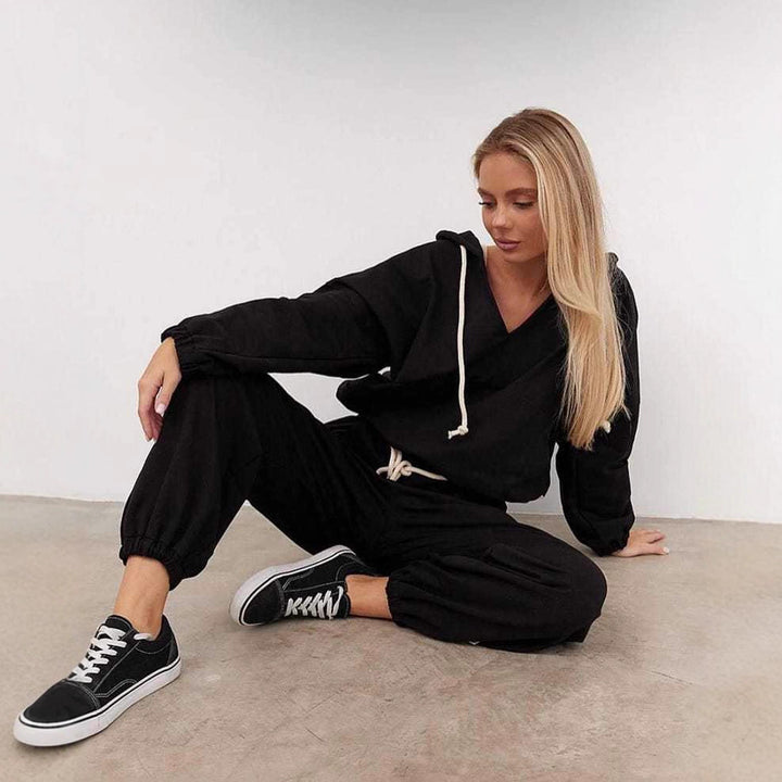 Kvinders casual jumpsuit med dyb V-hals og praktiske lommer
