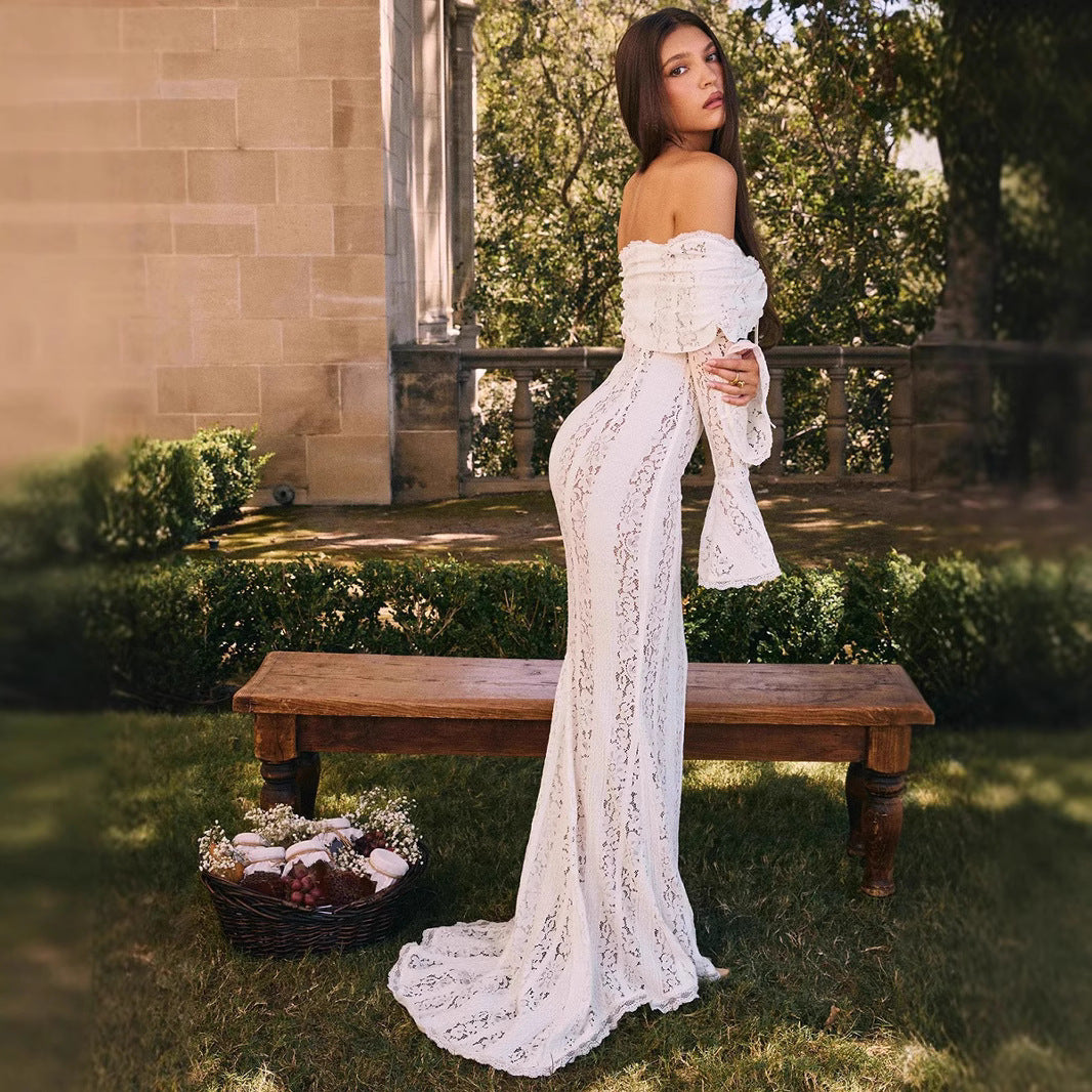 Dame spidsedragt med off-shoulder design og lange ærmer Stilla