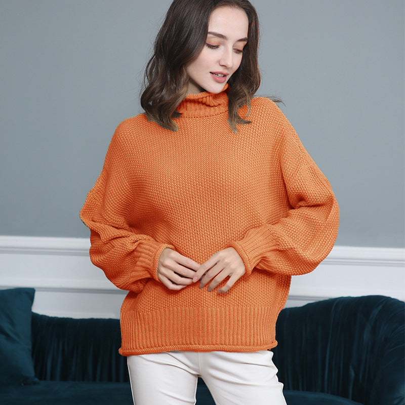 Dame striktrøje med højhalset krave og løs pasform Stilla