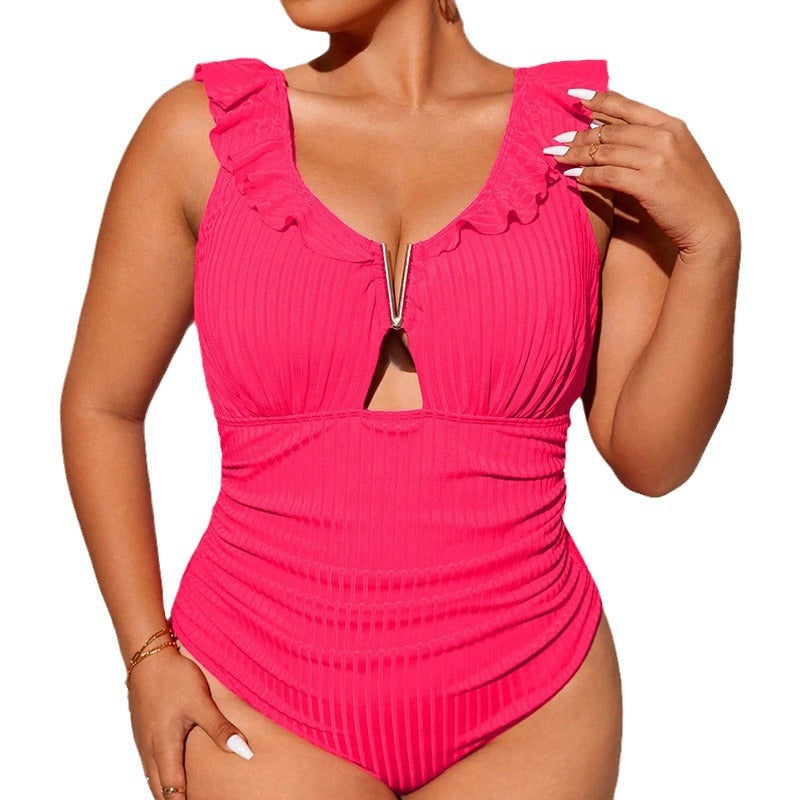 Dame one-piece badedragt med dekorative flæse detaljer og moderne cut-out.