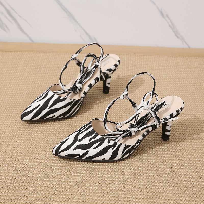 Dame Sling-Pumps med moderigtigt zebra-look og elegant rem-design Stilla