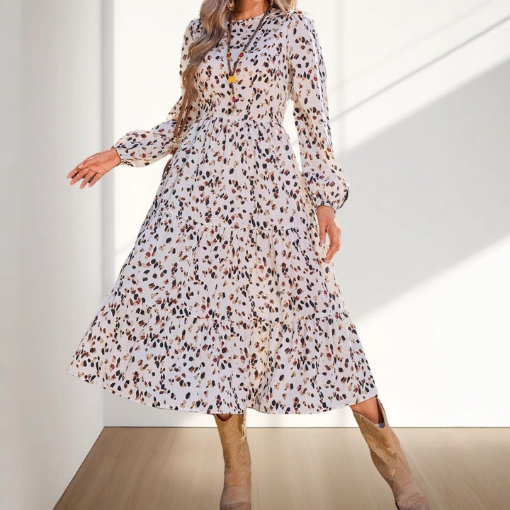 Dame maxikjole med voluminøse ærmer og elegant flæsedesign Stilla