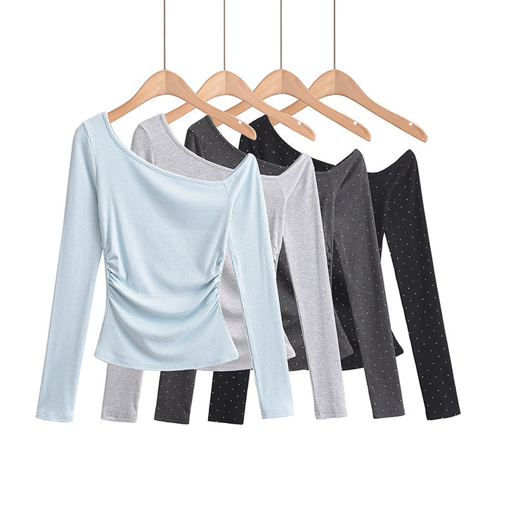 Dame asymmetrisk longsleeve-top med elegant ruffle-design og figurformende snit Stilla
