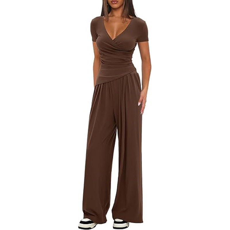 Dame afslappet jumpsuit med omslagsdesign og bredt ben Skovae